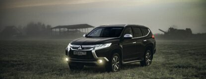 montero-sport-parked-on-grass-field