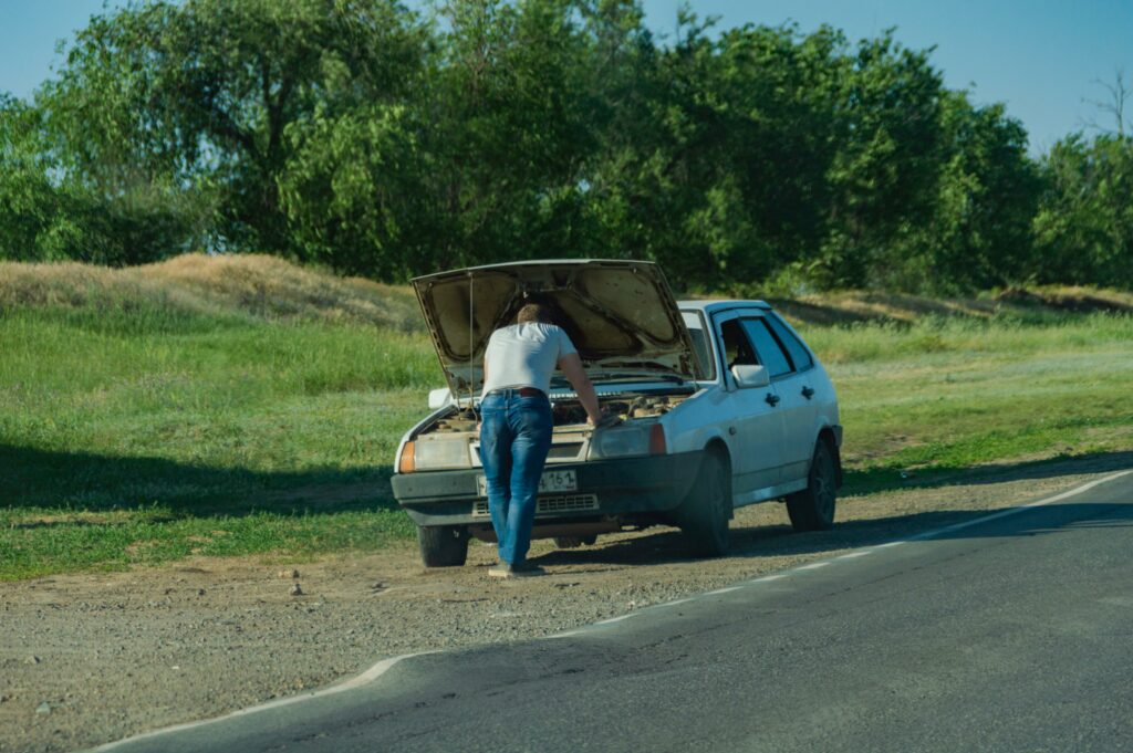 a-man-having-car-problems-on-the-roadside