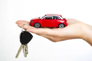 Car in hand with keys